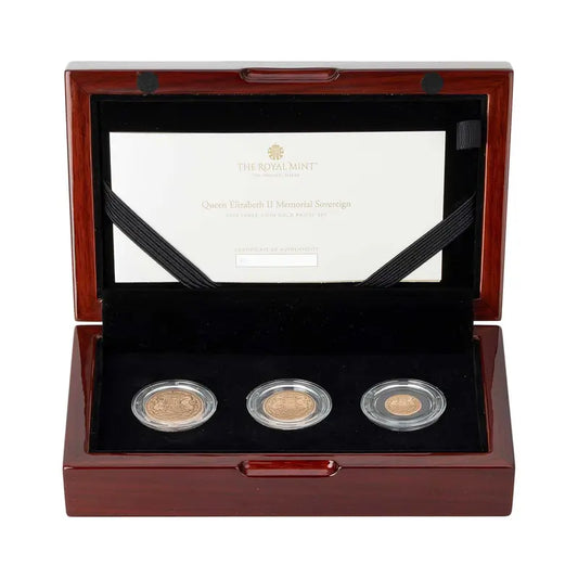 A premium display of the Memorial Sovereign 2022 Three-Coin Gold Proof Set, featuring a full sovereign, half sovereign, and quarter sovereign, crafted in 22-carat gold.